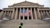 U.S. -- A man walks past the closed National Archives building in Washington, December 31, 2018