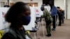 Michigan, U.S. - People vote at a polling station during the 2020 U.S. presidential election, in Flint